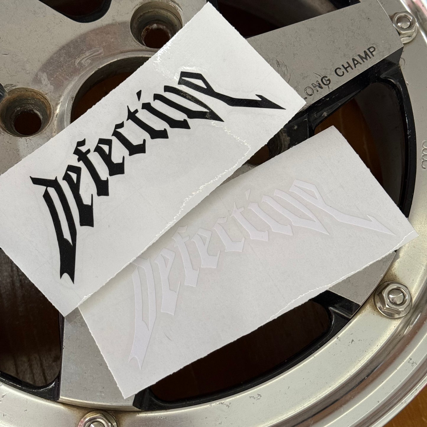 "defective" - small old english die cut