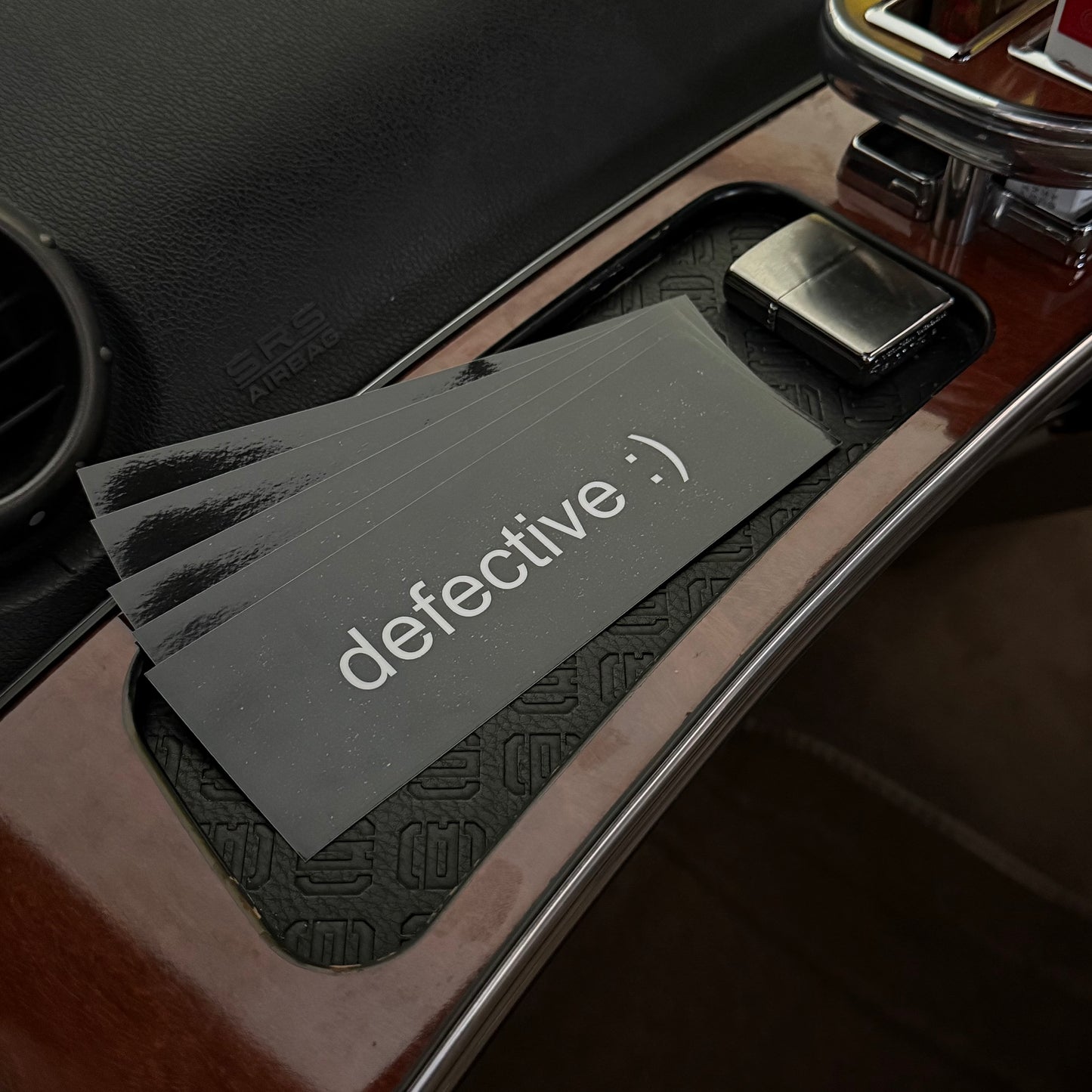 “defective :)” slap